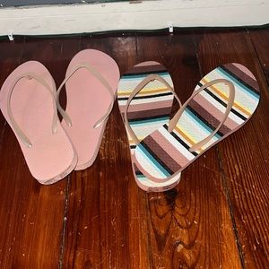2 pairs of large flip flops